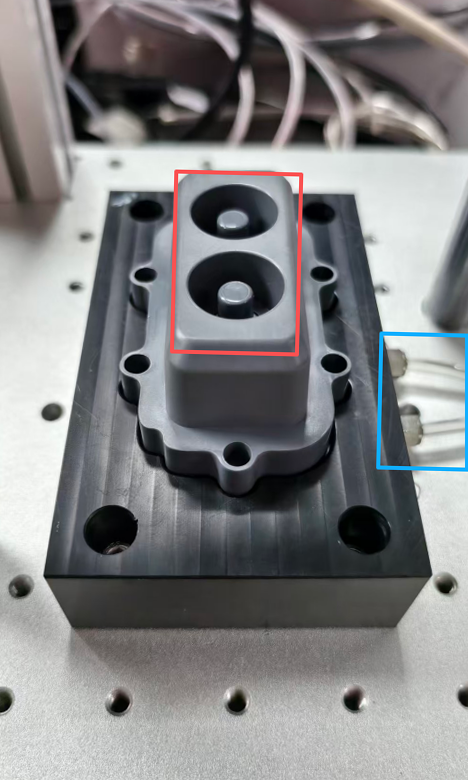 扫地机出水控制件在定制工装上